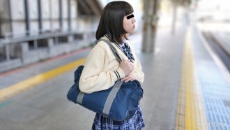 A girl wearing a uniform is the goal of eating food.